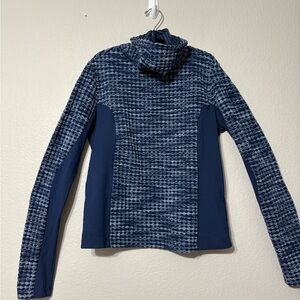 Nike Pro HyperWarm Pullover Top in Blue. Textured Main Body/Solid Side Funnel Ne